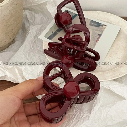 New for autumn and winter burgundy plastic cross bow disc hair grab clip cute red round ball hairpin hair grab.